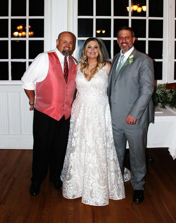 Jason and Jonea White, after a beautiful Ceremony at Thorncrown Chapel, pose for a picture with DJSean Hearn at their reception held at the Crescent Hotel in the conservatory in Eureka Springs Arkansas.